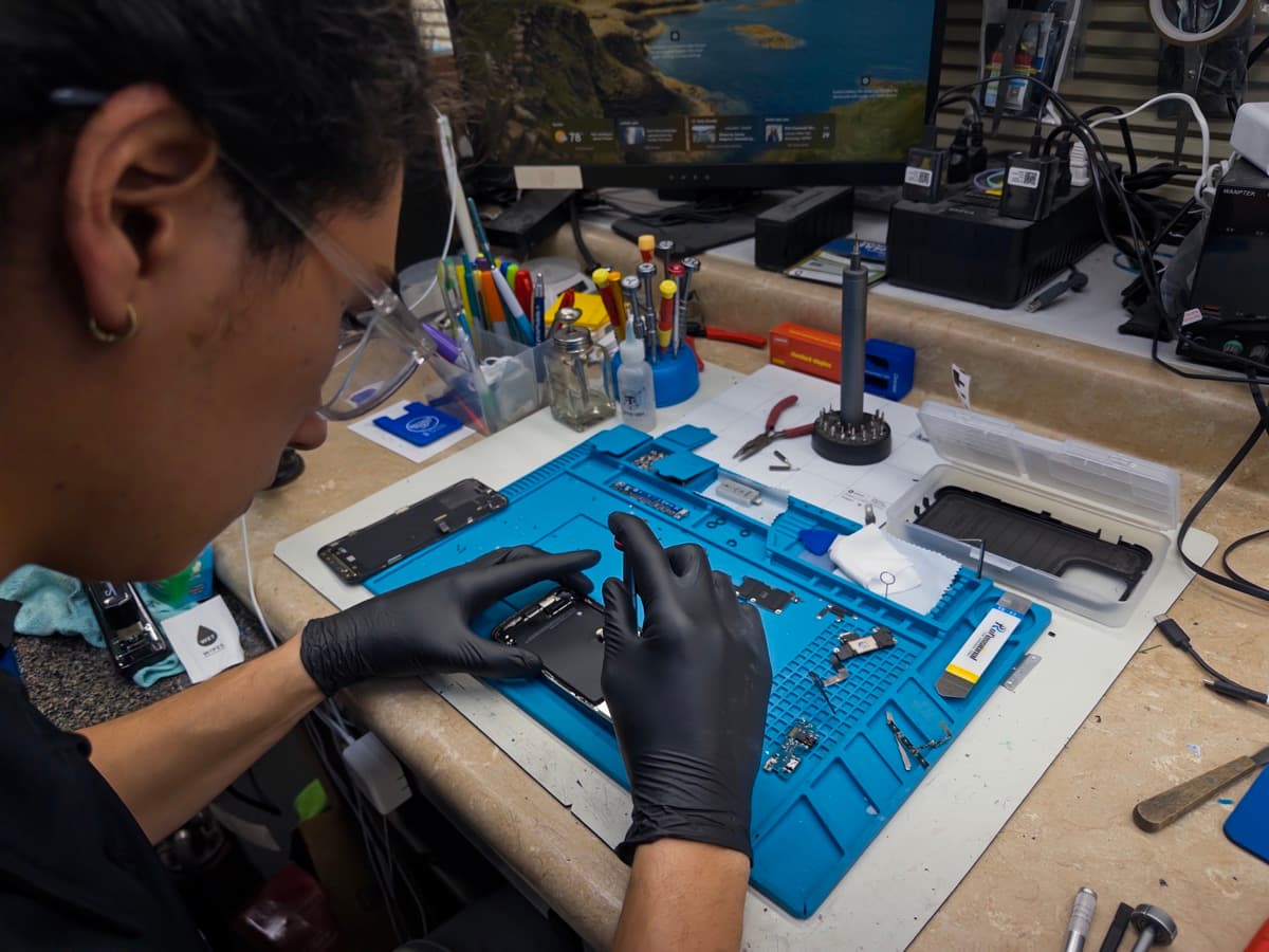 Expert Technician Repairing Phone